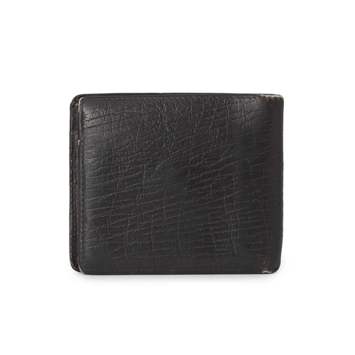 426 - Gucci, a leather bifold wallet, crafted from grained black leather, with a small gunmetal GG plaque ... 