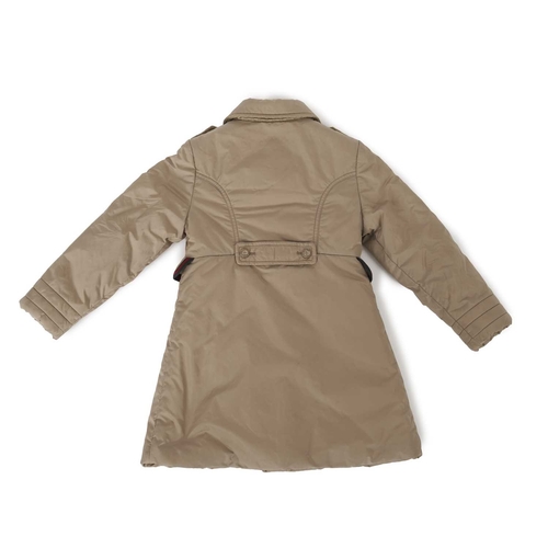 427 - Gucci, a child's coat, featuring a beige nylon shell, red and green striped trim, double-breasted fr... 