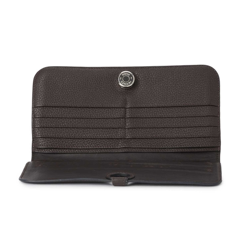 433 - Hermes, a 2010 Dogon wallet, crafted from grained chocolate brown Clemence leather, with logo-engrav... 