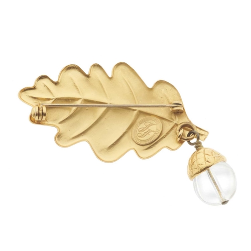 436 - Ines De La Fressange, a vintage 1980s brooch, designed as an oak leaf with hanging clear acorn charm... 