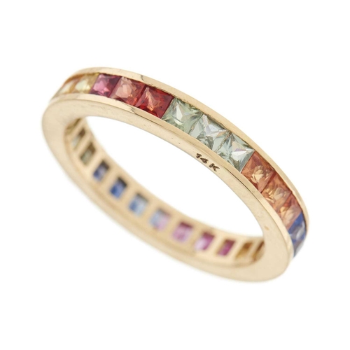 45 - A 14ct gold calibre-cut vari-hue sapphire full eternity ring, stamped 14K, ring size O, 3g