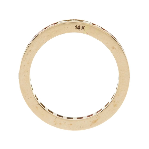 45 - A 14ct gold calibre-cut vari-hue sapphire full eternity ring, stamped 14K, ring size O, 3g