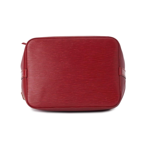 463 - Louis Vuitton, a red epi Petite Noe handbag, crafted from red textured epi leather, with a leather d... 