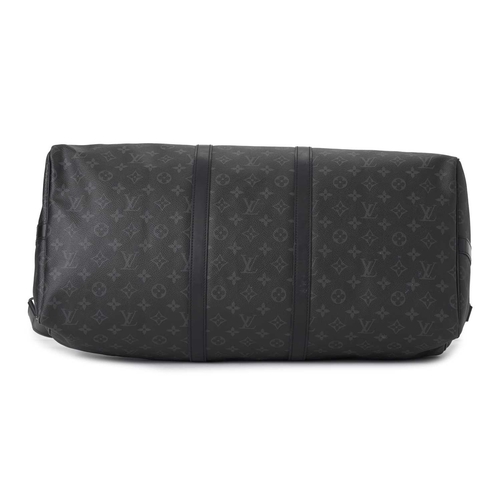 465 - Louis Vuitton, a monogram eclipse Keepall Bandouliere 55 luggage bag, crafted from black and grey mo... 