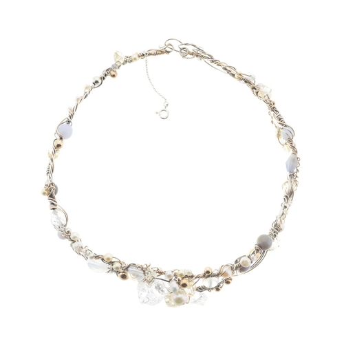 47 - A silver and gold, quartz, moonstone, chalcedony and cultured pearl wirework choker necklace, with h... 