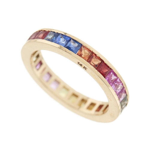 48 - A 14ct gold calibre-cut vari-hue sapphire full eternity ring, band engraved 14K, ring size L1/2, 3.2... 