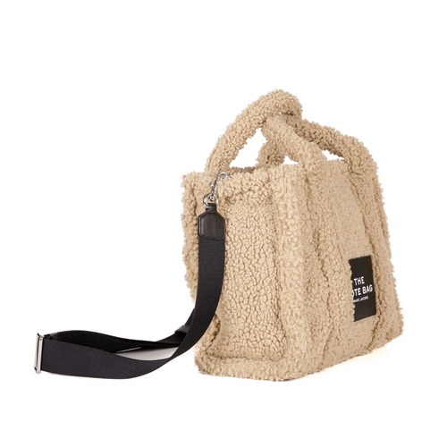 488 - Marc Jacobs, a medium Teddy tote, crafted from beige teddy fabric with black leather trim, featuring... 