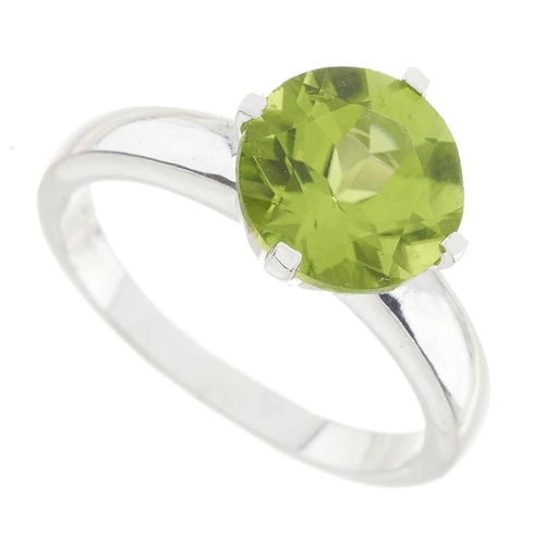 49 - An 18ct gold circular-shape peridot single-stone ring, peridot estimated weight 2.40ct, hallmarks fo... 