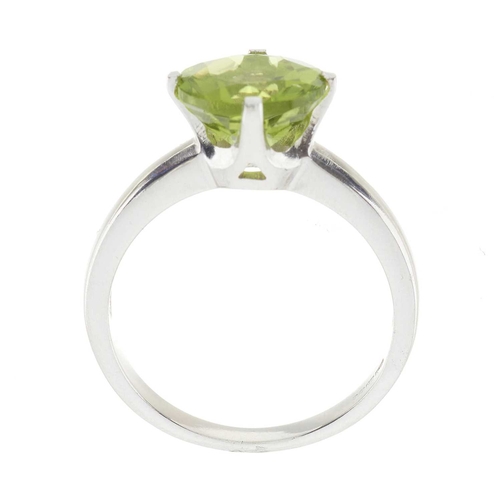 49 - An 18ct gold circular-shape peridot single-stone ring, peridot estimated weight 2.40ct, hallmarks fo... 