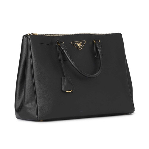 506 - Prada, a Galleria handbag, crafted from black saffiano leather, with gold-tone hardware accents, mak... 