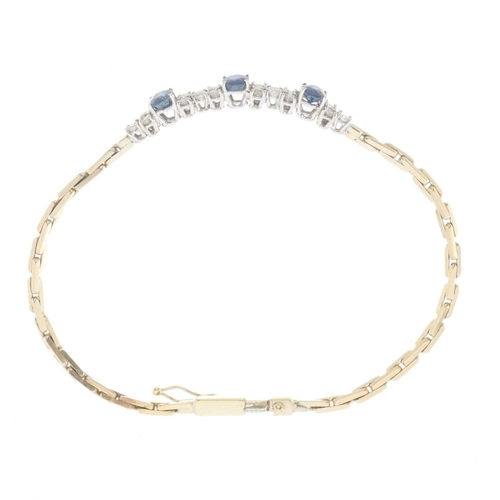 52 - A gold sapphire and brilliant-cut diamond bracelet, with brick-link chain sides and push-piece clasp... 