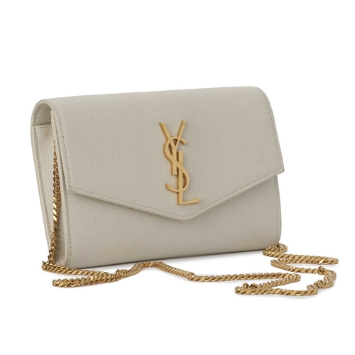 533 - Yves Saint Laurent, an envelope chain clutch w/card holder, designed with a cream-grained leather ex... 