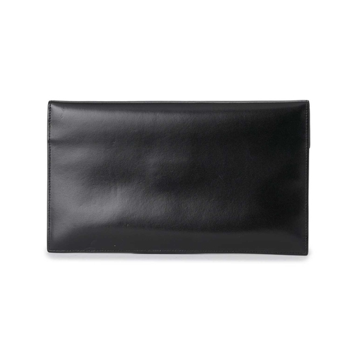 534 - Yves Saint Laurent, an envelope clutch, crafted from smooth black leather, featuring the maker's gol... 