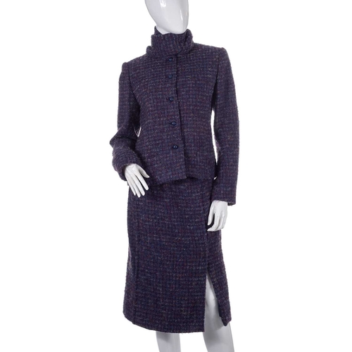 537 - A selection of ladies designer clothing, to include a purple boucle wool outfit by Guy Laroche, comp... 