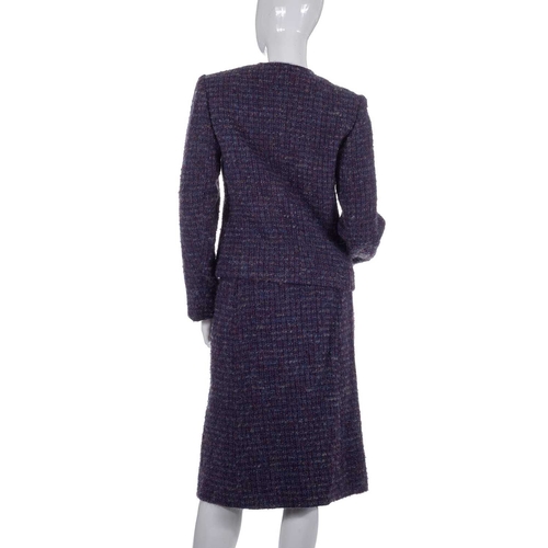 537 - A selection of ladies designer clothing, to include a purple boucle wool outfit by Guy Laroche, comp... 