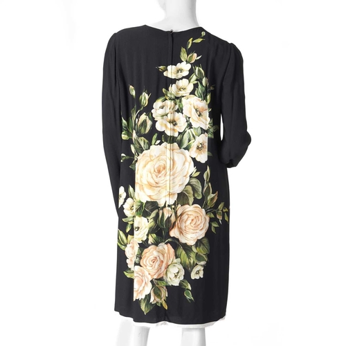 539 - Three items of ladies designer clothing, to include a black floral patterned Dolce & Gabanna dress, ... 