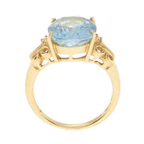 54 - An 18ct gold blue tourmaline single-stone dress ring, with brilliant-cut diamond accent shoulders, t... 