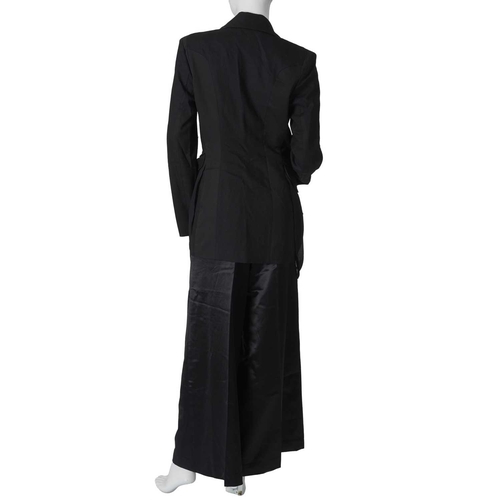 540 - Four items of ladies designer clothing, to include a black wool dress and matching long jacket by Je... 