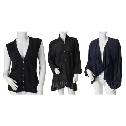 544 - Jean Muir, four items of ladies clothing and a Nina Ricci coat, to include a long navy blue cotton t... 