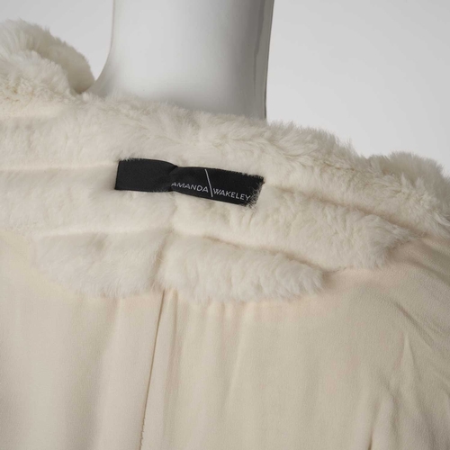 549 - Amanda Wakeley, a white coney fur coat, featuring a large lapel collar, hook and eye fastenings and ... 