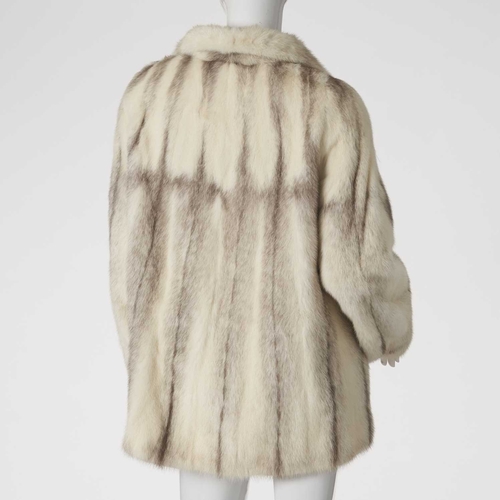 553 - D. Mc Cominksky, a marbled pearl mink jacket, featuring a lapel collar, hook and eye clip fastenings... 