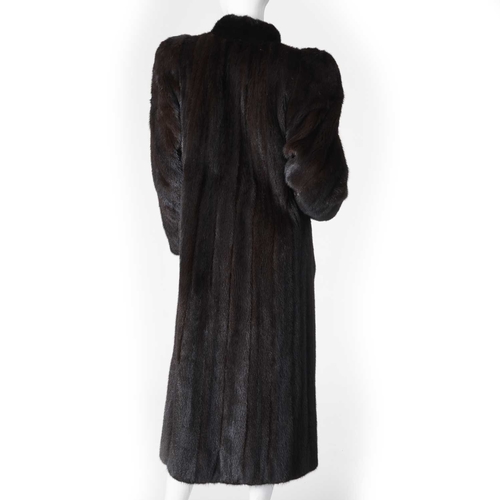 561 - Grosvenor Harrods, a full-length dark ranch mink coat, featuring a Mandarin collar with removable mi... 