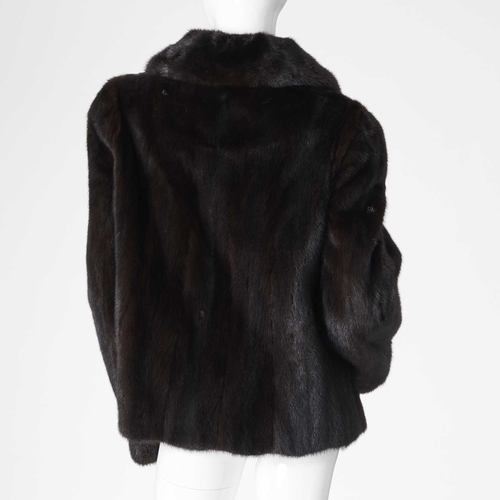 578 - Saga, a dark ranch mink jacket, featuring a lapel collar, hook and eye clip fastenings, two outer po... 