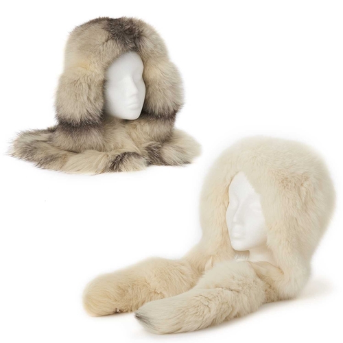 583 - A selection of fox fur accessories, to include a two-tone black and white fox fur hood with a single... 