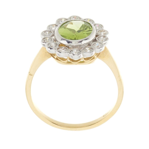 60 - An 18ct gold peridot and brilliant-cut diamond cluster ring, peridot estimated weight 1.60ct, estima... 