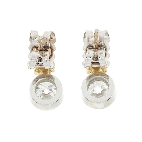 79 - A pair of 18ct gold old-cut diamond and brilliant-cut yellow diamond stud earrings, estimated total ... 