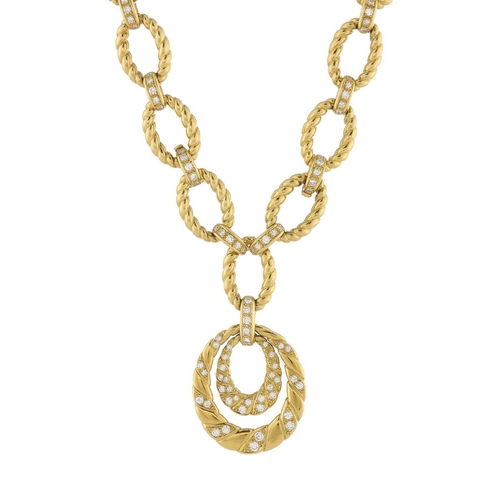 82 - A 1980s 18ct gold diamond grooved-link necklace, with brilliant-cut diamond line spacers and similar... 