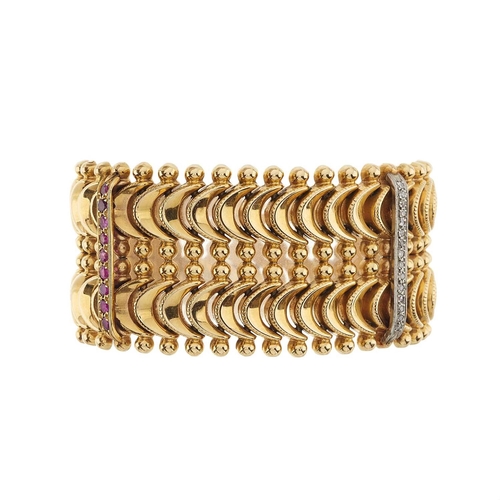 85 - An 18ct gold ruby and diamond line accent articulated bracelet, estimated total diamond weight 0.15c... 