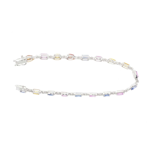 95 - An 18ct gold vari-hue sapphire and brilliant-cut diamond line bracelet, estimated total sapphire wei... 