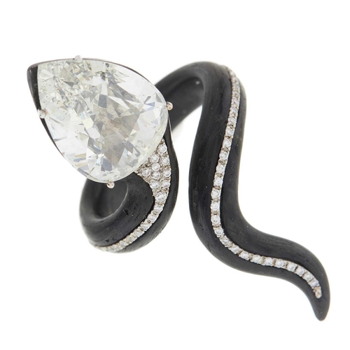 96 - Busatti Milano, an ebony and 18ct gold snake ring, with brilliant-cut diamond line body and pear-sha... 