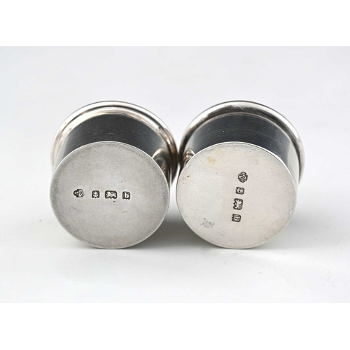 103 - Kate Harris for William Hutton, a pair of Arts and Crafts silver pill boxes, Birmingham 1901, cushio... 