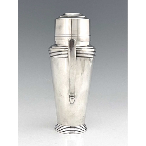 130 - Keith Murray for Mappin and Webb, an Art Deco silver plated cocktail shaker, circa 1933, shouldered ... 