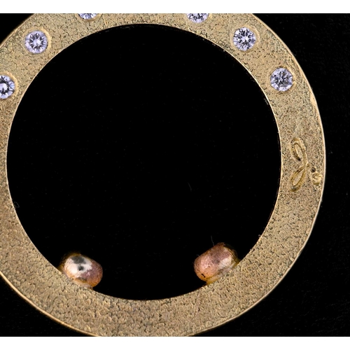 14 - An 18ct gold diamond band ring, the top set to each side with seven brilliant-cut diamonds, ring wit... 