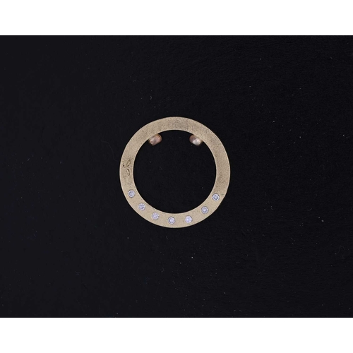 14 - An 18ct gold diamond band ring, the top set to each side with seven brilliant-cut diamonds, ring wit... 