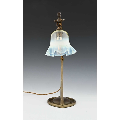 153 - W A S Benson, an Arts and Crafts brass table lamp, model 1079, circa 1900, strap arched arm on a fol... 