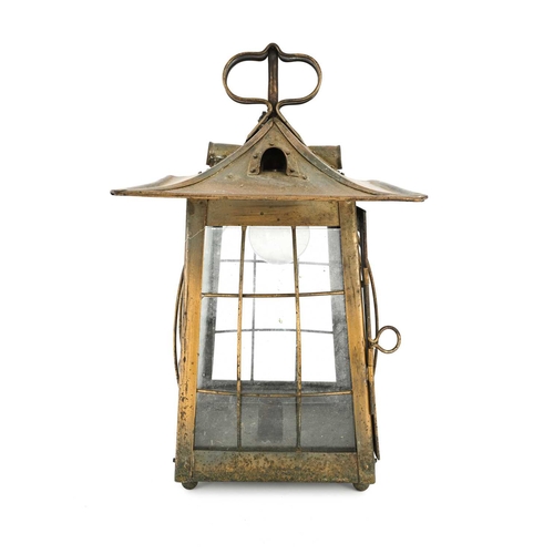 193 - An Arts and Craft brass pendant light, square section lantern form with pitched roof and riveted dor... 