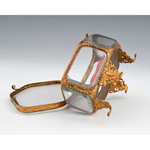 224 - A French Palais Royal gilt metal and glass panelled jewel casket, mid 19th century, navette form wit... 