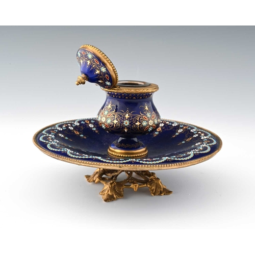 226 - A French enamelled and jewelled gilt metal ink stand, circa 1860, the central bombe form inkwell on ... 