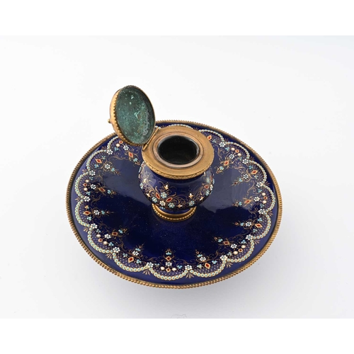 226 - A French enamelled and jewelled gilt metal ink stand, circa 1860, the central bombe form inkwell on ... 