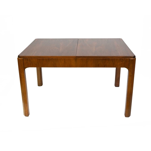 394 - Heals, London, an Art Deco figured walnut extending dining table, canted fluted supports, ivorine He... 