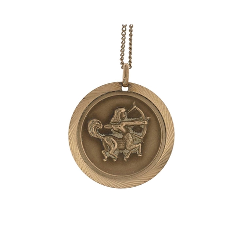 4 - A 9ct gold St Christopher and Sagittarius pendant, with chain