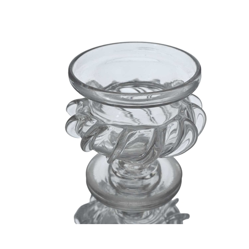 412 - An Anglo Irish pedestal glass compote, circa 1800, of Campana urn form with wrythen pincered fin lik... 