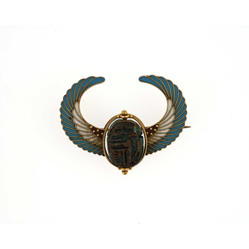 46 - An Egyptian Revivalist gold coloured metal and Ancient faience winged scarab brooch, in the Italian ... 