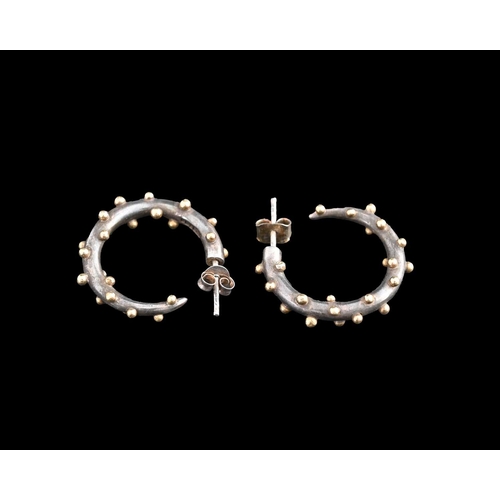 62 - Mark Nuell, a pair of silver hoop earrings with gold bead detail, silver hallmark for Birmingham 199... 