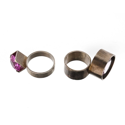 64 - Herman Hermsen, a silver pink synthetic sapphire ring, and another, both with maker's marks and stam... 