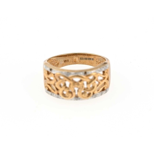 7 - A 9ct gold diamond accent openwork ring